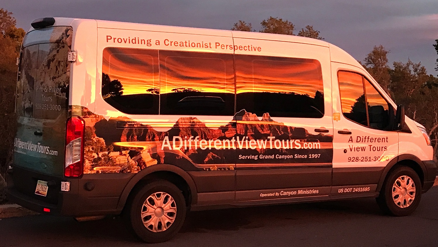 Canyon Ministries van with Grand Canyon Sunset Header